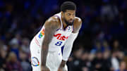 Mar 1, 2025; Philadelphia, Pennsylvania, USA; Philadelphia 76ers forward Paul George (8) looks on against the Golden State Warriors during the second quarter at Wells Fargo Center. Mandatory Credit: Bill Streicher-Imagn Images
