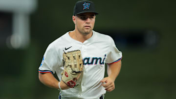 Aug 4, 2025; Miami, Florida, USA; Miami Marlins center fielder Jakob Marsee (87) returns to the dugout against the Houston Astros during the first inning at loanDepot 