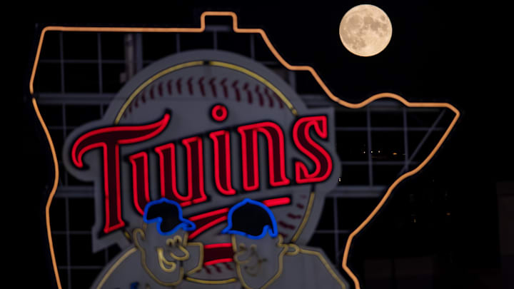 Sep 1, 2020; Minneapolis, Minnesota, USA; A full moon rises over the Minnesota Twins logo in a game between the Minnesota Twins and Chicago White Sox at Target Field. Mandatory Credit: Brad Rempel-Imagn Images