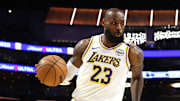 Mar 2, 2025; Los Angeles, California, USA; Los Angeles Lakers forward LeBron James (23) dribbles during the first quarter against the LA Clippers at Crypto.com Arena. Mandatory Credit: Jason Parkhurst-Imagn Images