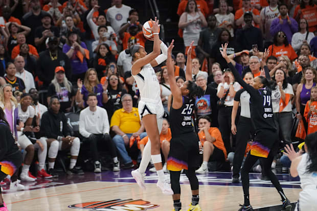  Aces center A'ja Wilson (22) makes a shot over Phoenix Mercury forward Alyssa Thomas 