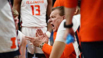 Mar 23, 2024; Omaha, NE, USA; Illinois Fighting Illini head coach Brad Underwood leads a team huddle during the second half against the Duquesne Dukes in the second round of the 2024 NCAA Tournament at CHI Health Center Omaha. Mandatory Credit: Dylan Widger-USA TODAY Sports