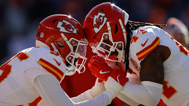 Jan 5, 2025; Denver, Colorado, USA; Kansas City Chiefs linebacker Joshua Uche (55) and linebacker Cam Jones (44) before the game against the Denver Broncos at Empower Field at Mile High. Mandatory Credit: Isaiah J. Downing-Imagn Images