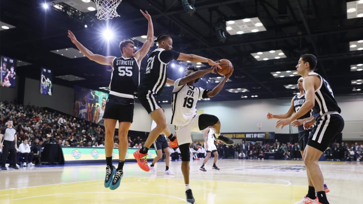 Feb 18, 2024; Indianapolis, Indiana, USA; Team ELY guard Ashton Hagans (19) of the Rip City Remix looks to play the ball defined by Team Strictly forward Cole Swider (21) of the Sioux Falls Skyforce during the G-League Next Up game at Indiana Convention Center. Mandatory Credit: Trevor Ruszkowski-USA TODAY Sports