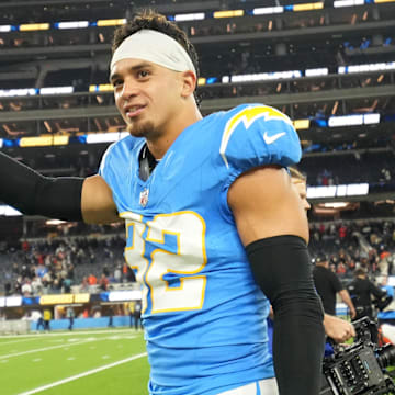 Nov 17, 2024; Inglewood, California, USA; Los Angeles Chargers safety Alohi Gilman (32) celebrates at the end of the game against the Cincinnati Bengals at SoFi Stadium. Mandatory Credit: Kirby Lee-Imagn Images