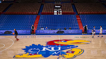 Mar 1, 2025; Lawrence, Kansas, USA; Kansas Jayhawks logo at center court prior to the game against the Texas Tech Red Raiders at Allen Fieldhouse. Mandatory Credit: William Purnell-Imagn Images