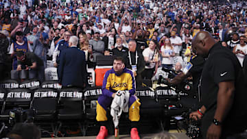 Apr 9, 2025; Dallas, Texas, USA;  Los Angeles Lakers guard Luka Doncic (77) reacts while watching a tribute video before the game against the Dallas Mavericks at American Airlines Center. Mandatory Credit: Kevin Jairaj-Imagn Images