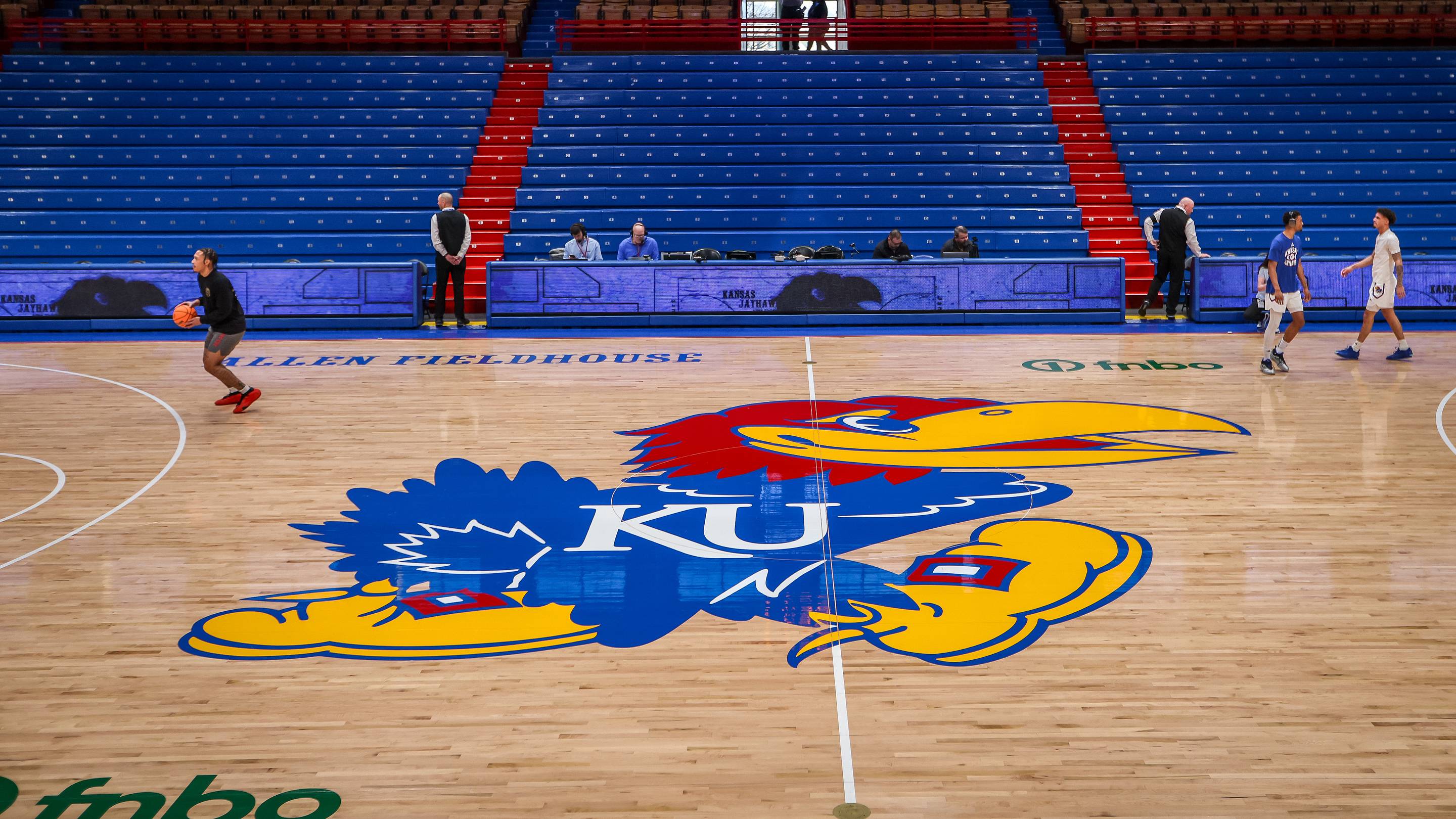 Mar 1, 2025; Lawrence, Kansas, USA; Kansas Jayhawks logo at center court prior to the game against the Texas Tech Red Raiders at Allen Fieldhouse. Mandatory Credit: William Purnell-Imagn Images | IMAGN IMAGES via Reuters Connect