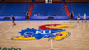 Mar 1, 2025; Lawrence, Kansas, USA; Kansas Jayhawks logo at center court prior to the game against the Texas Tech Red Raiders at Allen Fieldhouse. Mandatory Credit: William Purnell-Imagn Images