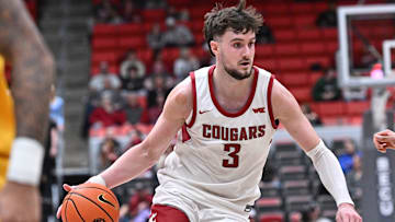 Jan 4, 2025; Pullman, Washington, USA; Washington State Cougars forward Ethan Price (3) controls the ball against the San Francisco Dons in the first half at Friel Court at Beasley Coliseum. Mandatory Credit: James Snook-Imagn Images