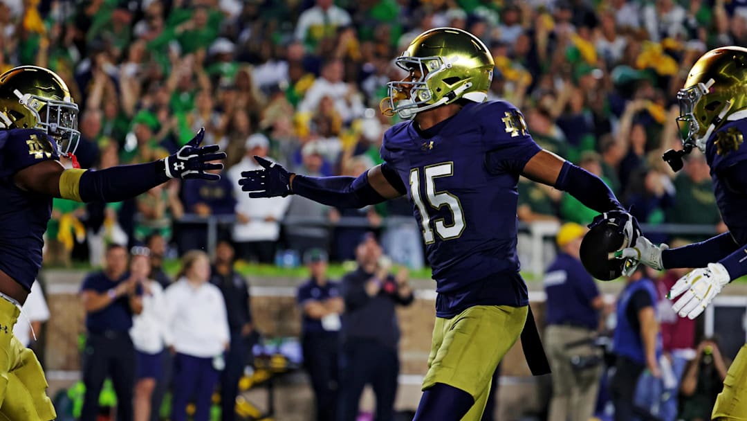 Sep 13, 2025; South Bend, Indiana, USA; Notre Dame Fighting Irish cornerback Leonard Moore (15) reacts after a play against the Texas A&M Aggies during the first half at Notre Dame Stadium. Mandatory Credit: Trevor Ruszkowski-Imagn Images