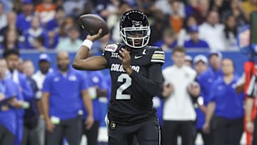 Dec 28, 2024; San Antonio, TX, USA; Colorado Buffaloes quarterback Shedeur Sanders (2) attempts a pass during the first quarter against the Brigham Young Cougars at Alamodome. Mandatory Credit: Troy Taormina-Imagn Images