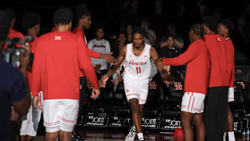 Nov 4, 2024; Houston, Texas, USA; Houston Cougars forward Joseph Tugler (11) is introduced before playing against the Jackson State Tigers in the first half at Fertitta Center. Mandatory Credit: Thomas B. Shea-Imagn Images