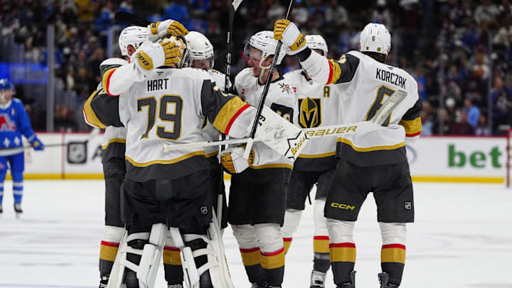 Apr 11, 2026; Denver, Colorado, USA; Members of the Vegas Golden Knights celebrate an overtime win against the Colorado Avalanche at Ball Arena. Mandatory Credit: Ron Chenoy-Imagn Images