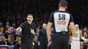 Thunder head coach Mark Daigneault speaks with an official during Game 1 of the Western Conference semifinals.