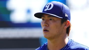 Mar 10, 2025; Phoenix, Arizona, USA; Los Angeles Dodgers pitcher Yoshinobu Yamamoto (18) returns to the dugout during the second inning of the game against the Arizona Diamondbacks at Camelback Ranch-Glendale. Mandatory Credit: Joe Camporeale-Imagn Images