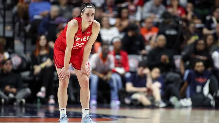 Sep 25, 2024; Uncasville, Connecticut, USA; Indiana Fever guard Caitlin Clark (22) looks on during the first half against the Connecticut Sun during game two of the first round of the 2024 WNBA Playoffs at Mohegan Sun Arena. Mandatory Credit: Paul Rutherford-Imagn Images