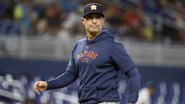 Aug 6, 2025; Miami, Florida, USA;  Houston Astros manager Joe Espada (19) walks back from the pitcher's mound against the Miami Marlins during the fourth inning at loanDepot Park.