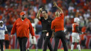 Sep 9, 2023; Miami Gardens, Florida, USA; Miami Hurricanes head coach Mario Cristobal celebrates after a touchdown against the Texas A&M Aggies during the fourth quarter at Hard Rock Stadium. Mandatory Credit: Sam Navarro-USA TODAY Sports