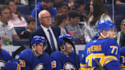 Sep 21, 2024; Buffalo, New York, USA;  Buffalo Sabres head coach Lindy Ruff watches his team from the bench during the first period against the Pittsburgh Penguins at KeyBank Center. Mandatory Credit: Timothy T. Ludwig-Imagn Images