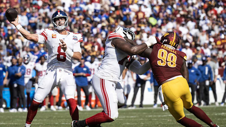 Sep 15, 2024; Landover, Maryland, USA; New York Giants quarterback Daniel Jones (8) passes the ball in the second half against the Washington Commanders at Commanders Field.  