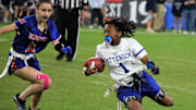 Patterson's I'Meriah Thorne eludes Boonsboro's Morgan Cook during the action at the Maryland girls flag football state championships at M&T Bank Stadium.