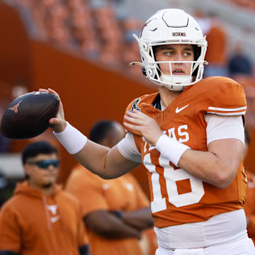 Texas Longhorns quarterback Arch Manning against the Clemson Tigers during the CFP National playoff first round at Darrell K Royal-Texas Memorial Stadium. 