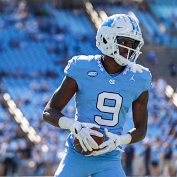 Oct 7, 2023; Chapel Hill, North Carolina, USA; North Carolina Tar Heels wide receiver Devontez Walker (9) warms up before the game against the Syracuse Orange at Kenan Memorial Stadium. Mandatory Credit: Jaylynn Nash-Imagn Images