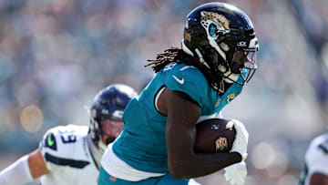 Oct 12, 2025; Jacksonville, Florida, USA; Jacksonville Jaguars wide receiver Brian Thomas Jr. (7) scores a touchdown that is called back for a flag during the second half against the Seattle Seahawks at EverBank Stadium. Mandatory Credit: Morgan Tencza-Imagn Images