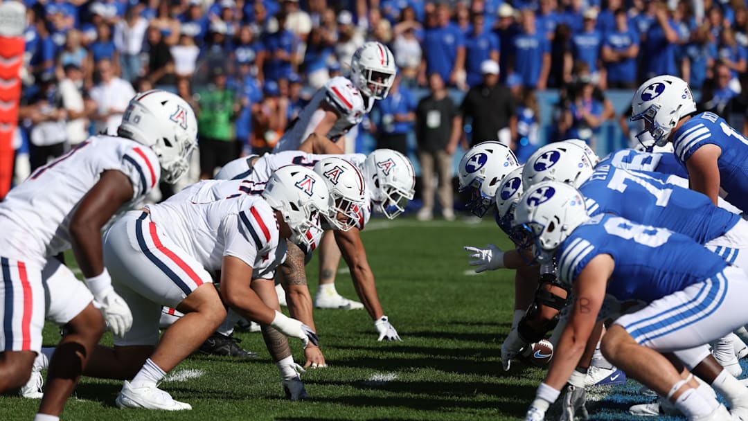 Oct 12, 2024; Provo, Utah, USA; The Arizona Wildcats defense lines up against the Brigham Young Cougars offense during the second quarter at LaVell Edwards Stadium. Mandatory Credit: Rob Gray-Imagn Images
