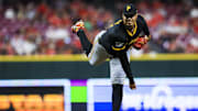 Sep 23, 2025; Cincinnati, Ohio, USA; Pittsburgh Pirates starting pitcher Johan Oviedo (24) pitches against the Cincinnati Reds in the fifth inning at Great American Ball Park. Mandatory Credit: Katie Stratman-Imagn Images