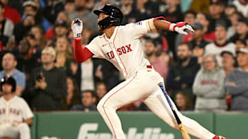 Jun 9, 2025; Boston, Massachusetts, USA; Boston Red Sox second baseman Kristian Campbell (28) hits a RBI against the Tampa Bay Rays during the ninth inning at Fenway Park. Mandatory Credit: Brian Fluharty-Imagn Images