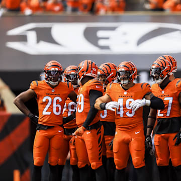 Sep 8, 2024; Cincinnati, Ohio, USA; Members of the Cincinnati Bengals stand on the field during a stop in play in the second half against the New England Patriots at Paycor Stadium. Mandatory Credit: Katie Stratman-Imagn Images