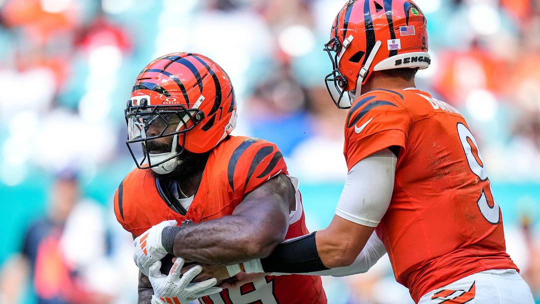 Cincinnati Bengals quarterback Joe Burrow (9) hands off to running back Samaje Perine (34) in the fourth quarter of the NFL Week 5 game between the Miami Dolphins and the Cincinnati Bengals at Hard Rock Stadium in Miami Gardens, Florida, on Sunday, Oct. 11, 2026. The Bengals improved to 3-2 on the season with a 31-24 win on the road. Cincinnati Bengals quarterback Joe Burrow (9) hands off to running back Samaje Perine (34) in the fourth quarter of the NFL Week 5 game between the Miami Dolphins and the Cincinnati Bengals at Hard Rock Stadium in Miami Gardens, Florida, on Sunday, Oct. 11, 2026. The Bengals improved to 3-2 on the season with a 31-24 win on the road.