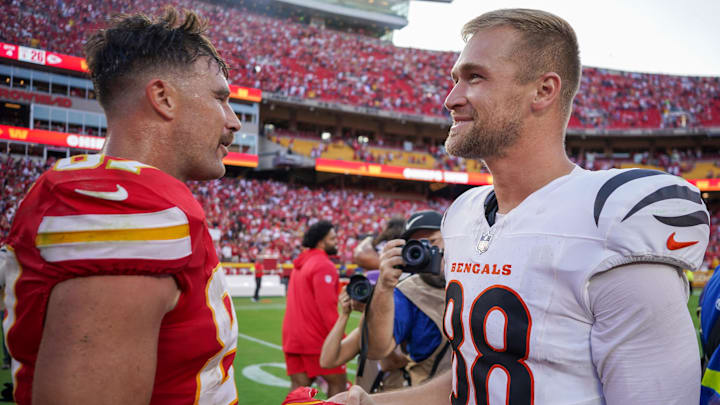 Sep 15, 2024; Kansas City, Missouri, USA; Kansas City Chiefs tight end Travis Kelce (87) greets Cincinnati Bengals tight end Mike Gesicki (88) after the at GEHA Field at Arrowhead Stadium. Mandatory Credit: Denny Medley-Imagn Images