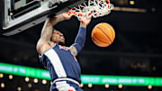 Arizona Wildcats guard Caleb Love (1) dunks during the second half against the Texas Tech Red Raiders at T-Mobile Center.