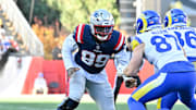 Nov 17, 2024; Foxborough, Massachusetts, USA; New England Patriots defensive end Keion White (99) blocking Los Angeles Rams tight end Davis Allen (87) during the first half at Gillette Stadium. Mandatory Credit: Eric Canha-Imagn Images
