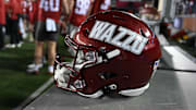 Sep 20, 2024; Pullman, Washington, USA; Washington State Cougars helmet sits during a game against the San Jose State Spartans in the first half at Gesa Field at Martin Stadium. Mandatory Credit: James Snook-Imagn Images