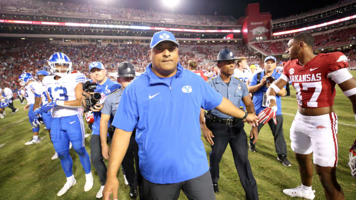 Sep 16, 2023; Fayetteville, Arkansas, USA; BYU Cougars head coach Kalani Sitake celebrates after the game against the Arkansas Razorbacks at Donald W. Reynolds Razorback Stadium. BYU won 38-31.