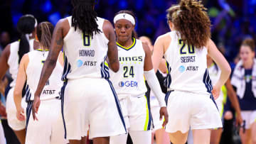 Dallas Wings guard Arike Ogunbowale (24) celebrates.