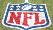 General view of the NFL shield logo on the field at the Tom Benson Hall of Fame Stadium site of the Professional Football Hall of Fame game and induction ceremonies