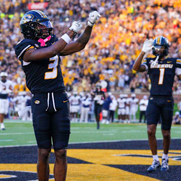 Aug 29, 2024; Columbia, Missouri, USA; Missouri Tigers wide receiver Luther Burden III (3) celebrates after scoring against the Murray State Racers during the game at Faurot Field at Memorial Stadium. Mandatory Credit: Denny Medley-Imagn Images