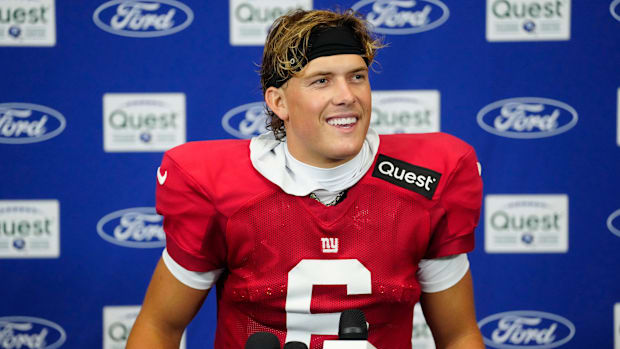New York Giants quarterback Jaxson Dart (6) speaks to the press.