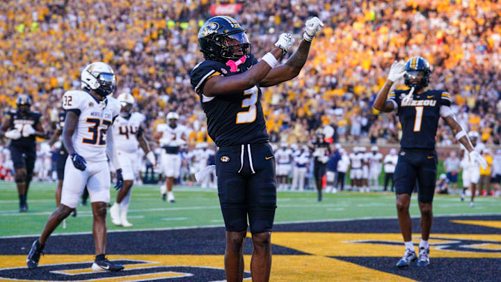 Aug 29, 2024; Columbia, Missouri, USA; Missouri Tigers wide receiver Luther Burden III (3) celebrates after scoring against the Murray State Racers during the game at Faurot Field at Memorial Stadium. Mandatory Credit: Denny Medley-Imagn Images