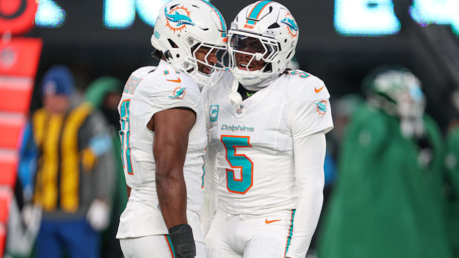 Miami Dolphins cornerback Jalen Ramsey (5) celebrates a defensive stop with linebacker Tyrel Dodson (11) during the first quarteragainst the New York Jets at MetLife Stadium last season. | Vincent Carchietta-Imagn Images