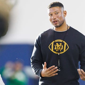 Notre Dame head coach Marcus Freeman greets his players during a Notre Dame football spring practice at Irish Athletic Center on Wednesday, March 19, 2025, in South Bend.
