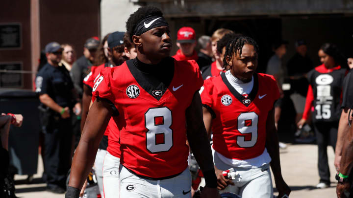 Georgia wide receiver Colbie Young (8) arrives with the team before the start of the G-Day spring football game in Athens, Ga., on Saturday, April 13, 2024.