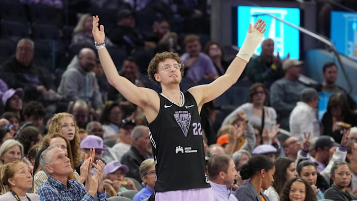 Jun 1, 2025; San Francisco, California, USA; Golden State Warriors guard Brandin Podziemski (center) cheers during the third quarter of the game between the Golden State Valkyries and the Minnesota Lynx at Chase Center. Mandatory Credit: Darren Yamashita-Imagn Images