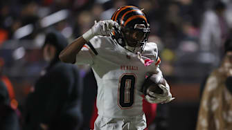 Fleet Central East wide receiver Xavior Jones salutes after scoring on a 52-yard reverse in the second quarter of his team's 55-36 CIF Northern California Division 1-A championship win at Pittsburg on Dec. 6.