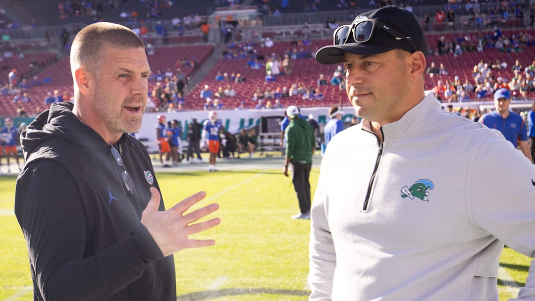 New Florida Gators head coach Jon Sumrall (right) replaced Billy Napier.